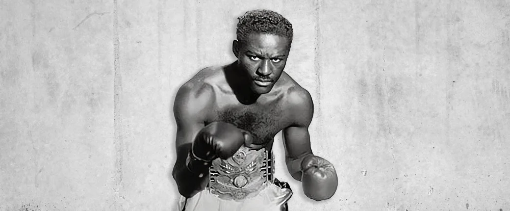 Image of Ezzard Charles, an American boxer doing a boxing pose