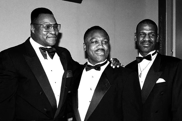 Larry Holmes, Joe Frazier and Michael Spinks posing for the camera